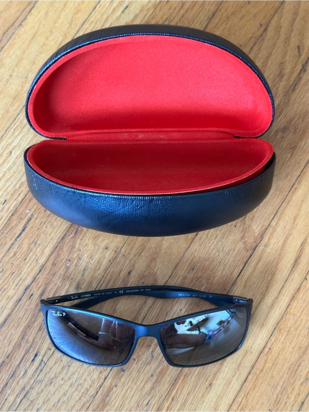 Ray-Ban Black Sunglasses with Red-Lined Black Case